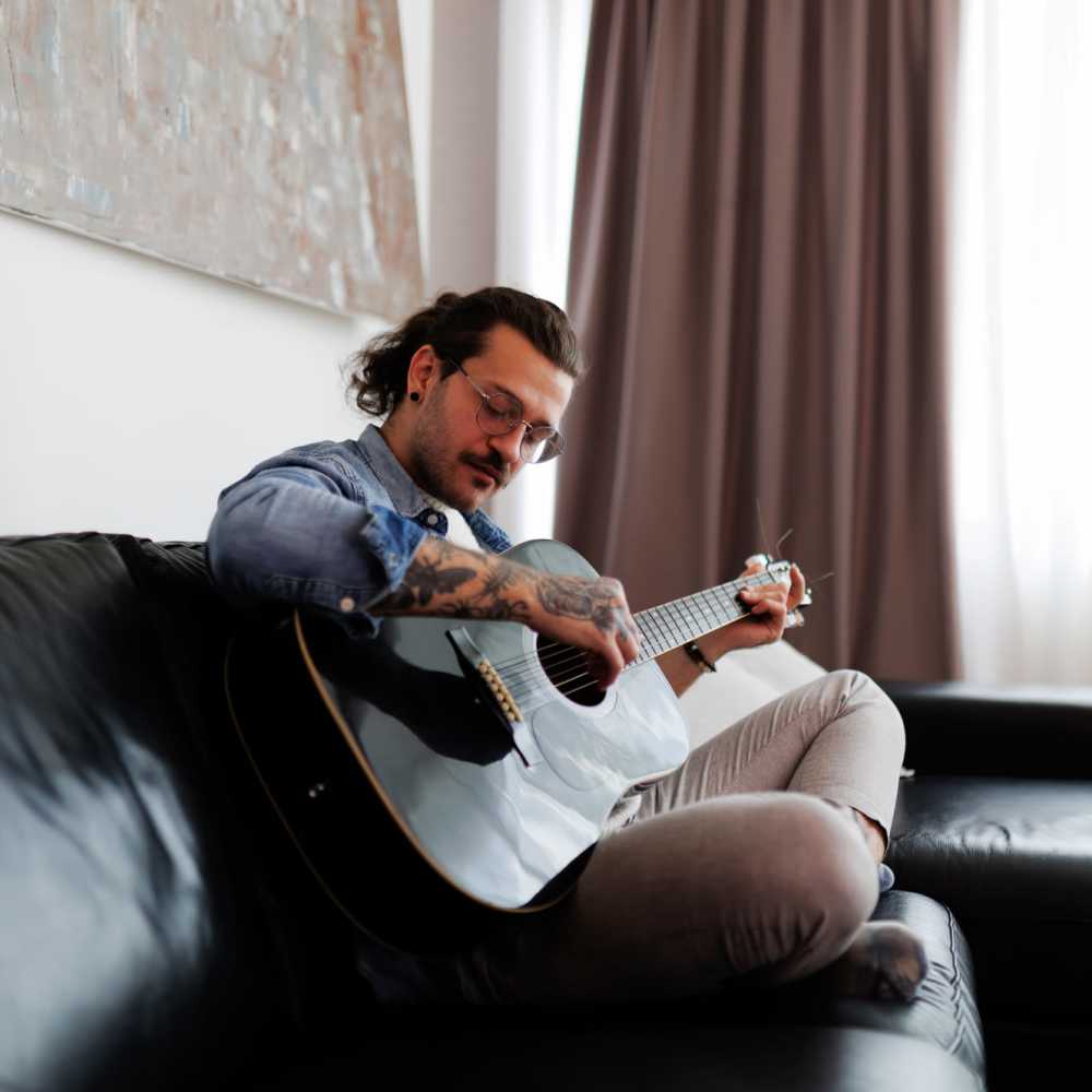 Resident in a living room at Greyes Place in Crawfordville, Florida