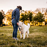 Resident with her dog at Maplewood in Chesapeake, Virginia