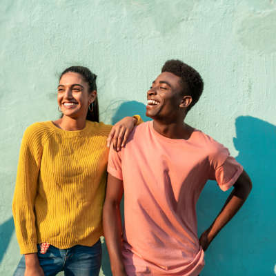 Couple standing against a wall near LeSilve in Middleton, Wisconsin