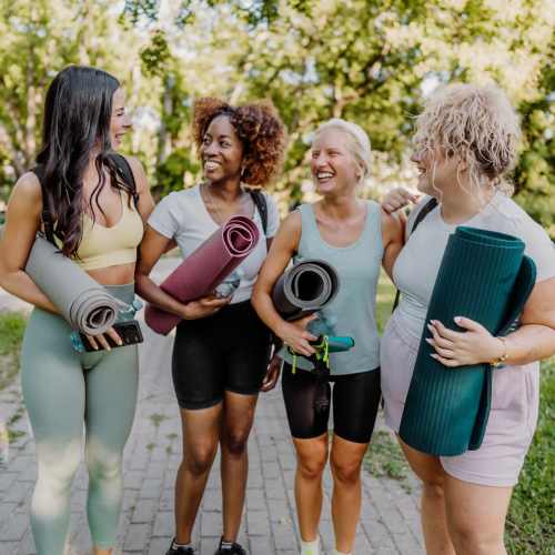 Resident with yoga mats at Cresta Bella in San Diego, California