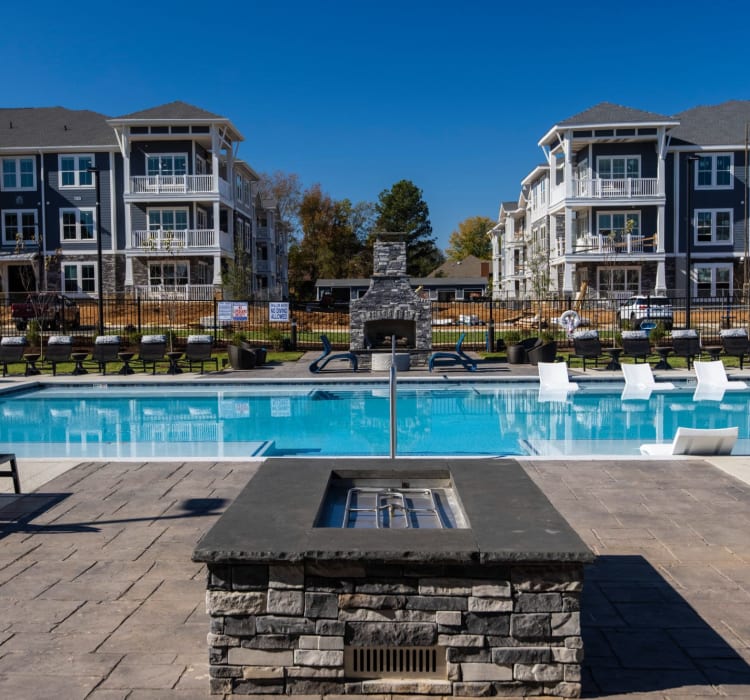 Warm up in next to the firepit by the pool at Parc at Murfreesboro in Murfreesboro, Tennessee