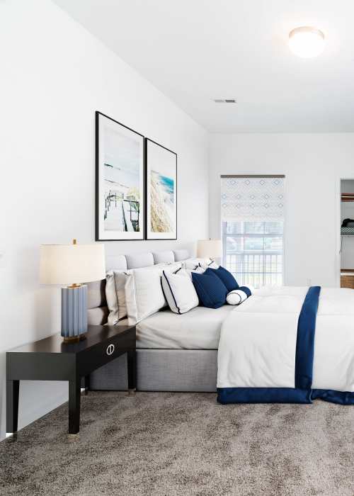 Comfy carpeted bedroom at Sand Ridge in Wilmington, North Carolina
