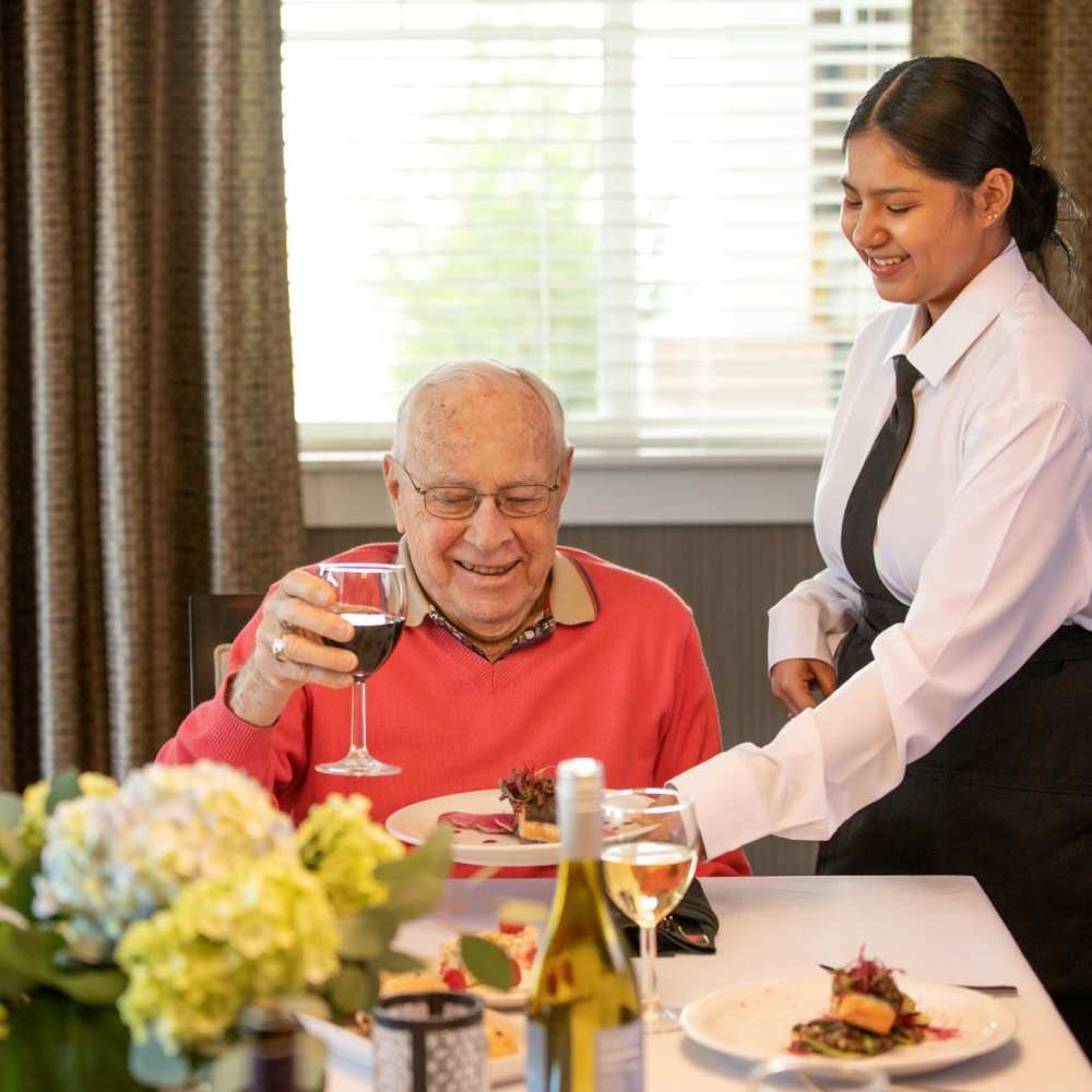 Residents enjoying a meal at Clearwater Newport Beach in Newport Beach, California