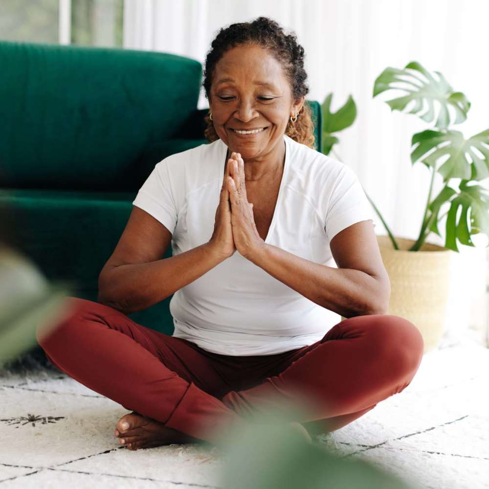 Resident meditating at Capital Towers in Raleigh, North Carolina