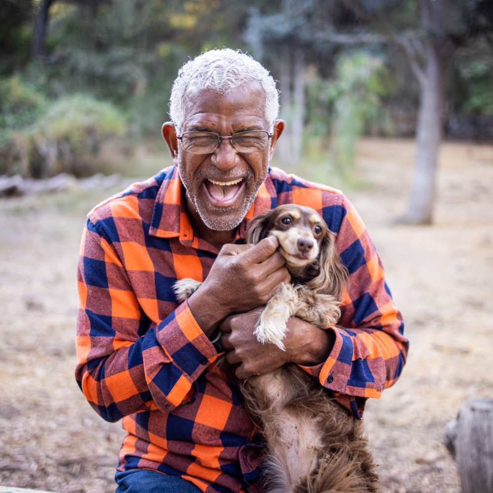 Resident with his pet giving a pose at Park on Gilder Creek in Mauldin, South Carolina