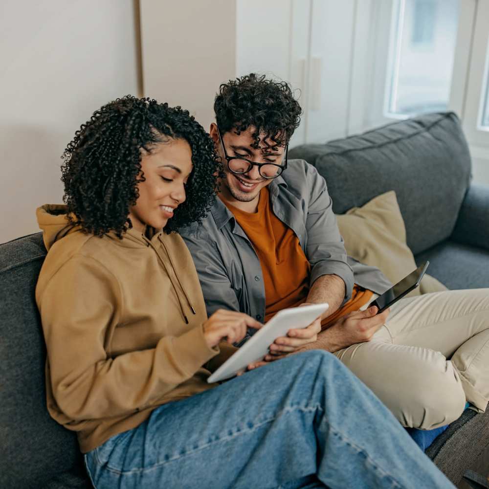 Residents studying together in living room at Titan Court in Eugene, Oregon