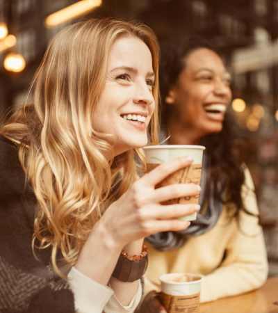 Residents having coffee at a favorite cafe near Walnut Apartments in Philadelphia, Pennsylvania