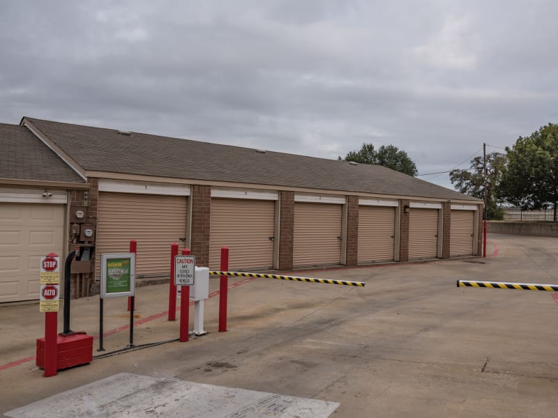 A gated entryway to outdoor storage units at U-Stor Hwy 183 in Euless, Texas