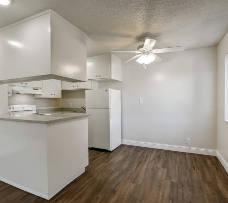 Kitchen and dining room at Marina Haven Apartment Homes in San Leandro, California