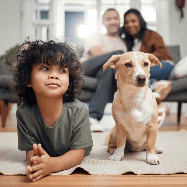 A family and their puppy at Attain at Chic’s Beach, Virginia Beach, Virginia