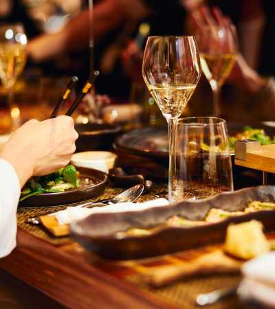 Resident having their meal at a favorite restaurant near The Marke Apartment Homes in Santa Ana, California
