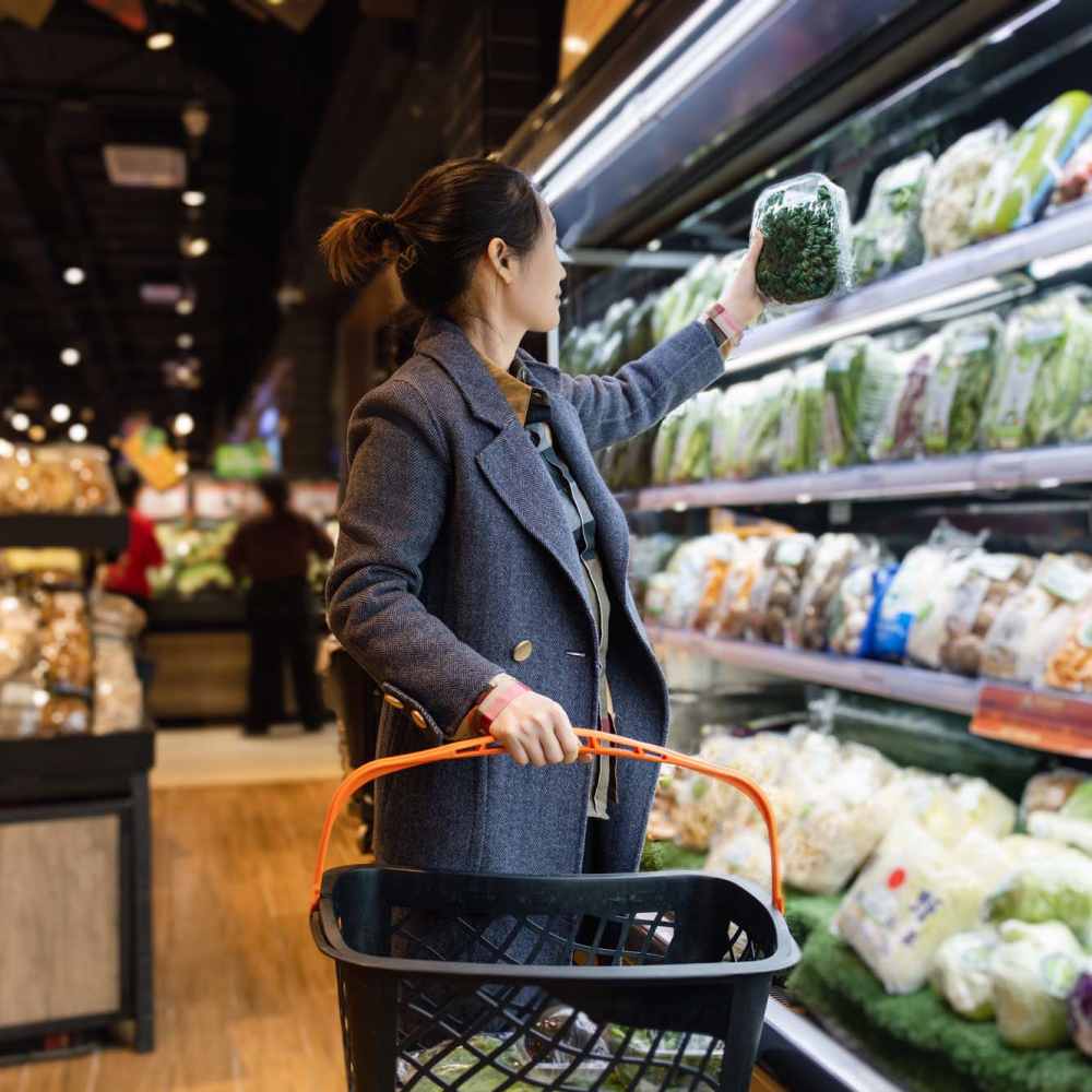 Resident shopping for groceries near The Orchards at Cherry Creek Park in Centennial, Colorado