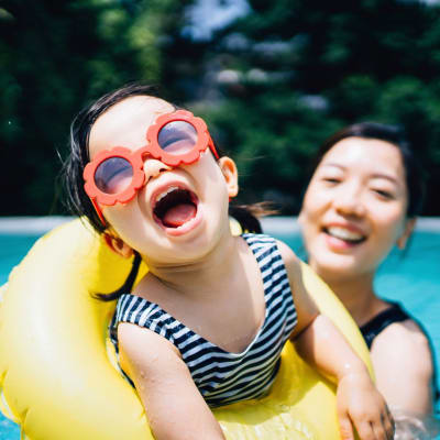 Women enjoying the pool at Devonwood Apartment Homes in Charlotte, North Carolina