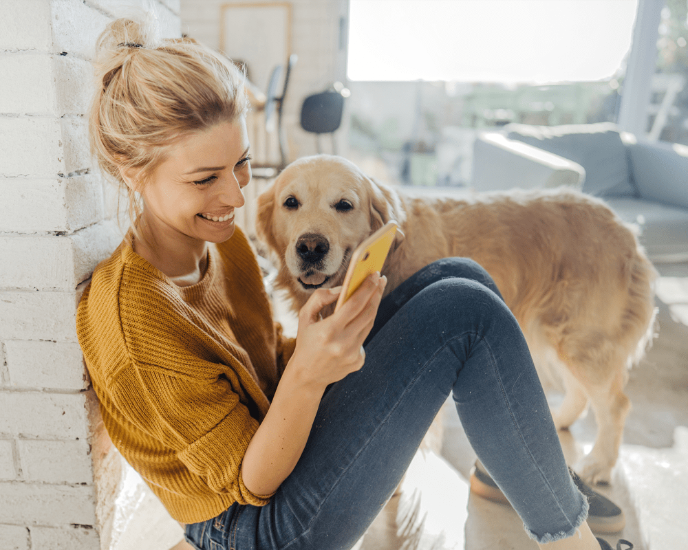 A resident and her dog at Ravello 192 in Elkhorn, Nebraska