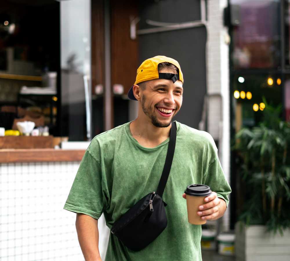 Resident grabbing a coffee near 1801L Apartments in Sacramento, California