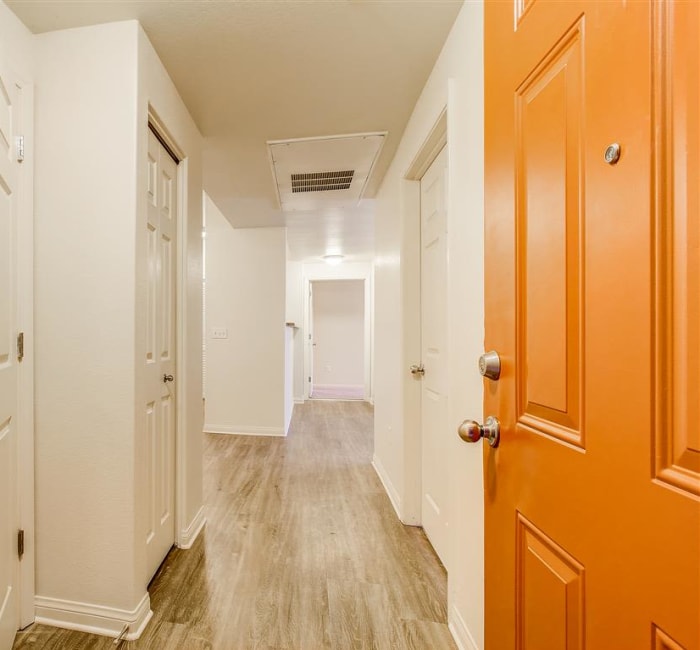 View of the entrance and hallway to a model home at Sierra Oaks Apartments in Turlock, California