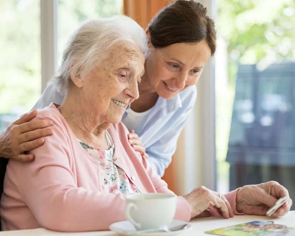 Residents assemble a jigsaw puzzle at Addington Place of Burlington in Burlington, Iowa.
