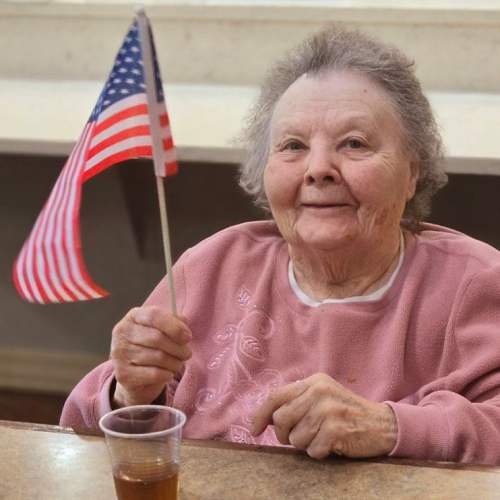 A resident getting back massage by caretaker at Glen Carr House Memory Care in Derby, Kansas