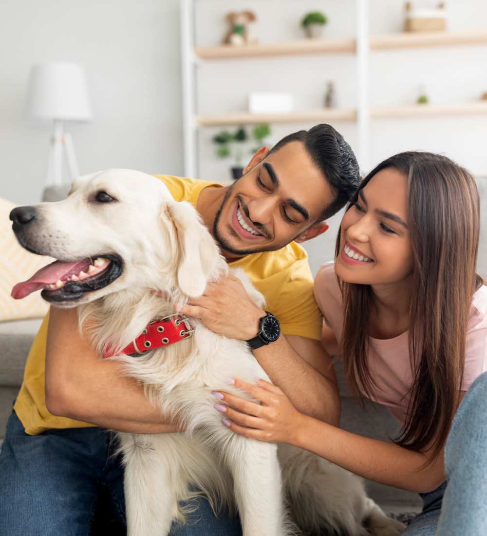 Residents with their dog at Gateway Lofts in Lansing, Michigan
