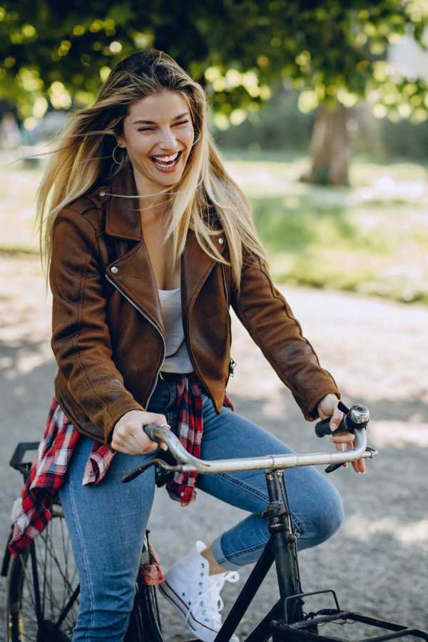 Resident cycling near The Abbey at Hightower in North Richland Hills, Texas