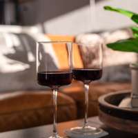Two glasses of wine on a coffee table The Summit in Redmond, Washington
