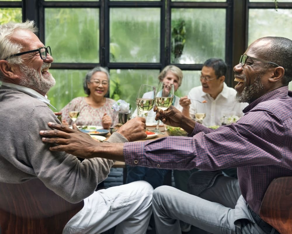 Residents enjoying dinner near Southington, Connecticut near Eden and Main Apartments