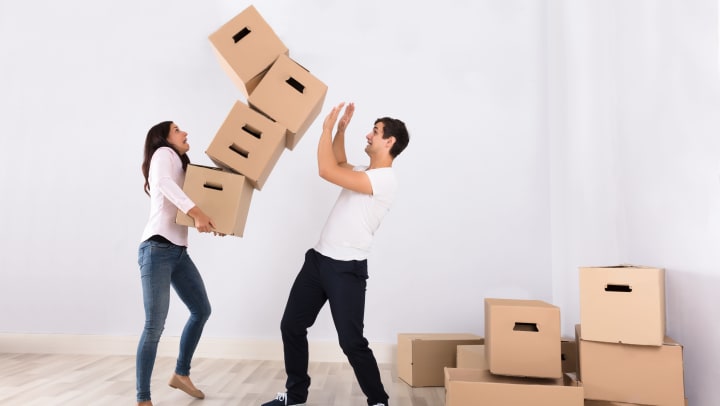 Couple moving boxes