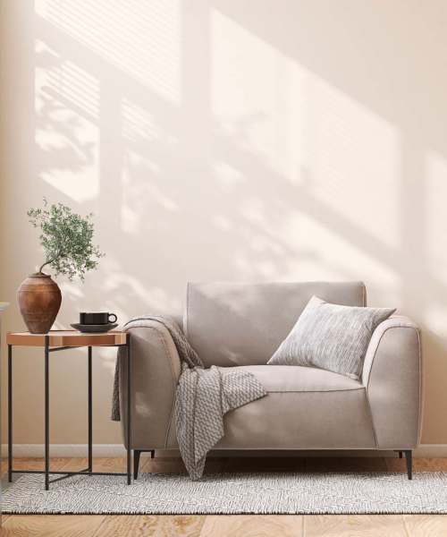 Soft couch in the living room at Walnut Apartments in Philadelphia, Pennsylvania