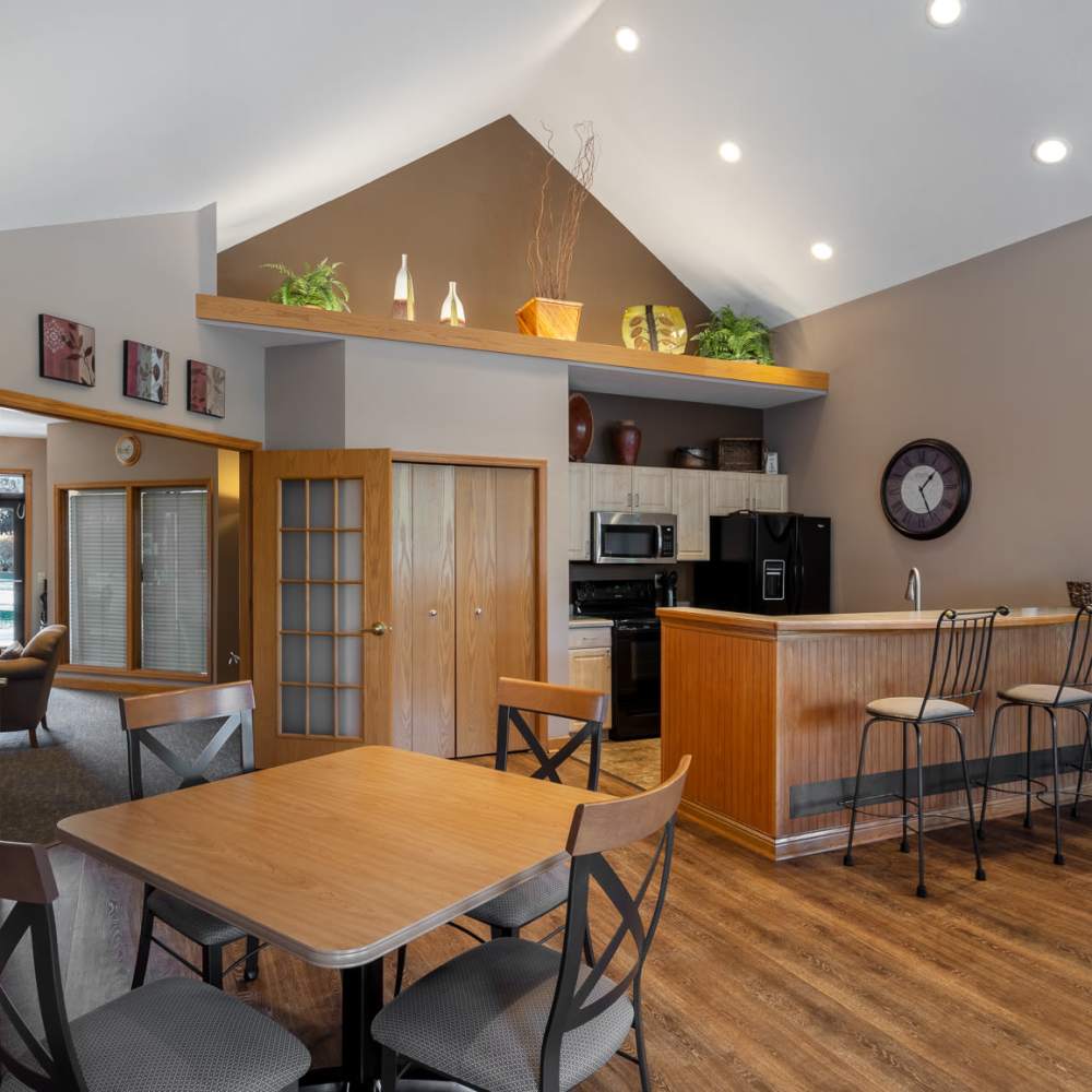 Kitchen with black appliances at Deer Creek in Middleton, Wisconsin 