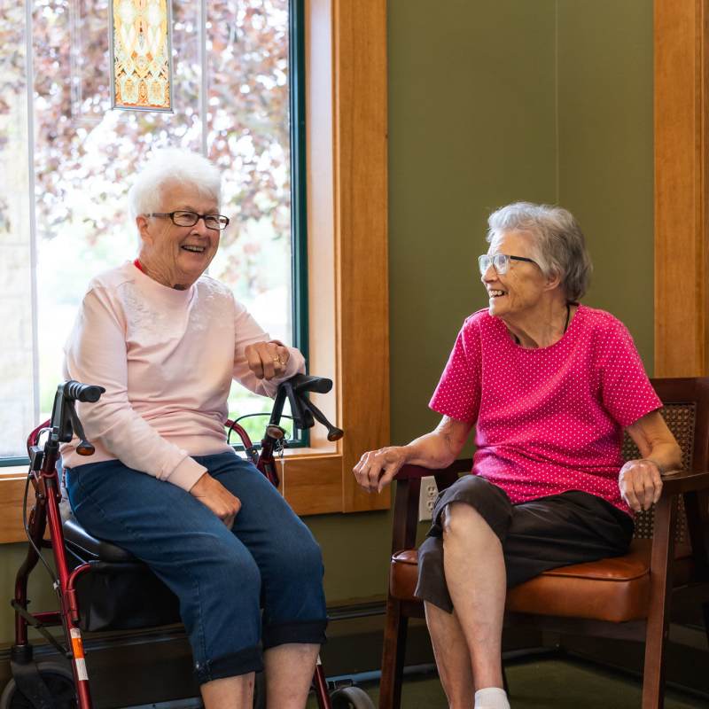 Residents chatting at Meadows on Fairview in Wyoming, Minnesota