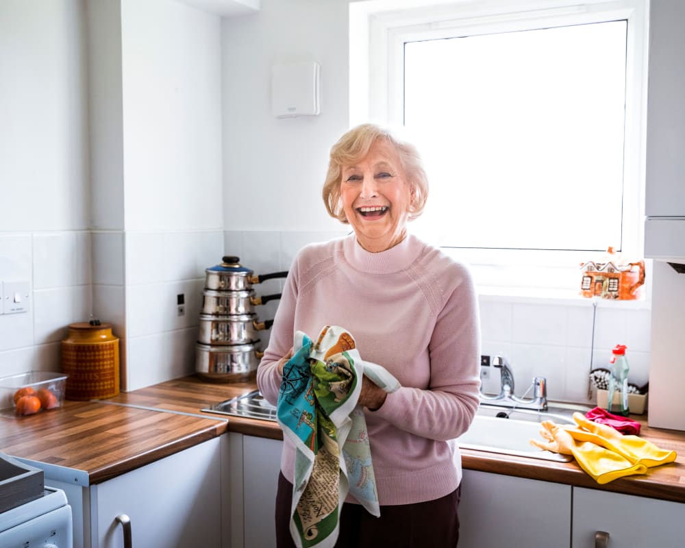 Resident in her kitchen at Arlington Place of Red Oak in Red Oak, Iowa.