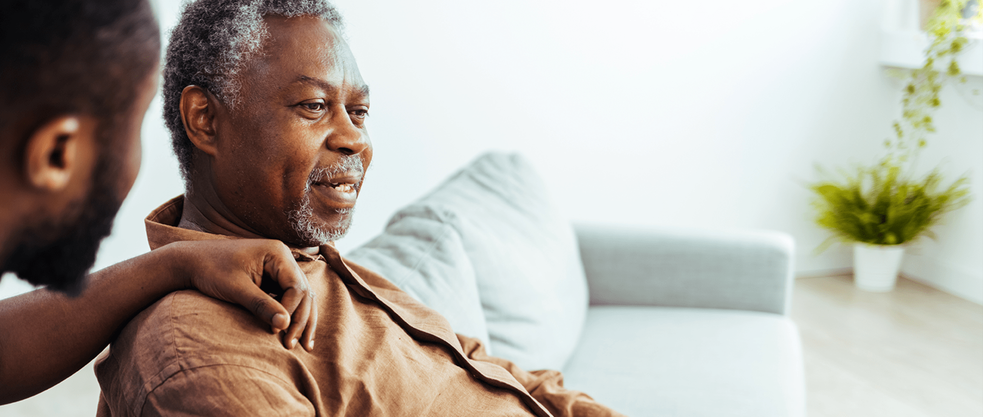 Resident talking with staff member