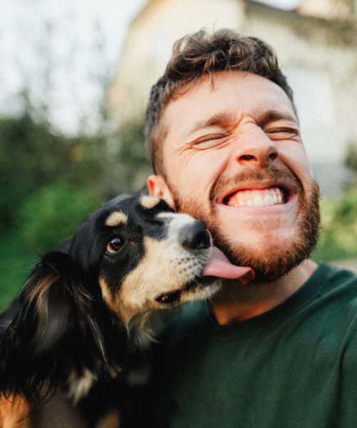 Resident man with his dog at The Julien in Charlotte, North Carolina