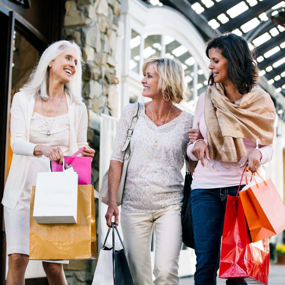 Women shopping together at a mall near Ellsworth Commons Apartments in Greenville, North Carolina