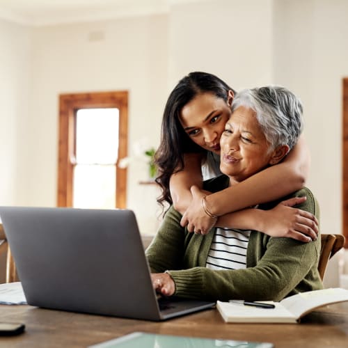 A women and her mother renting a unit online from North County Self Storage