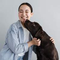 Woman with her pet dog at Sunset Lodge in Odessa,Texas
