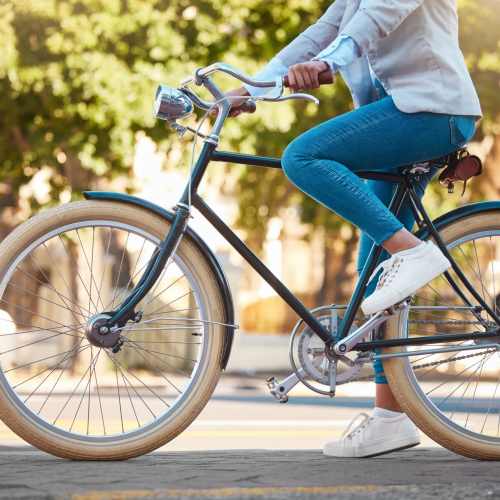 Resident biking to work from home at The Courtyards Pacific Village in San Diego, California