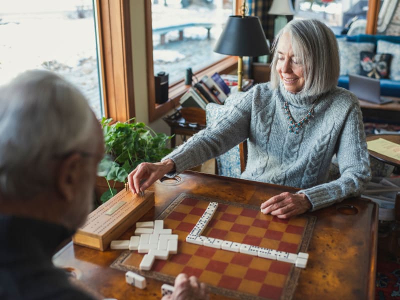 Residents playing dominoes at a cafe near Neawanna By The Sea in Seaside, Oregon. 