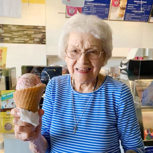 Resident with ice cream at Oxford Villa Active Senior Apartments in Wichita, Kansas