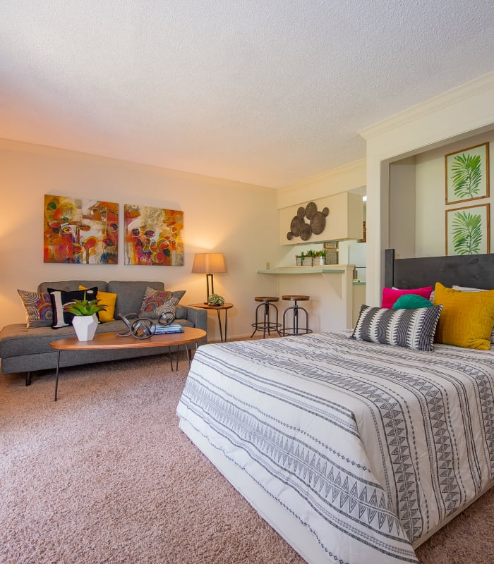 Studio apartment living area and bed at Summerfield Place Apartments in Oklahoma City, Oklahoma