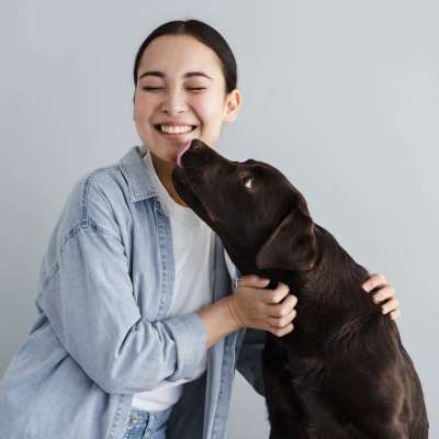 Women with playing with her dog at LeSilve in Middleton, Wisconsin