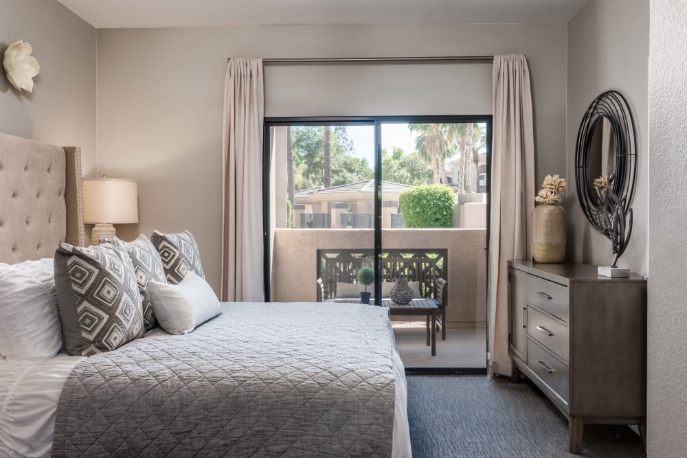 Large primary bedroom with beautiful furnishings in a model home at Ascend at Kierland in Scottsdale, Arizona