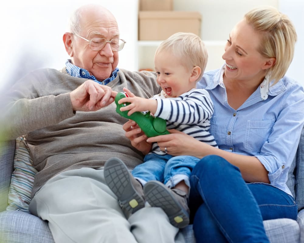Senior man with grandson and daughter at Welbrook at Bloomington in Bloomington, Illinois