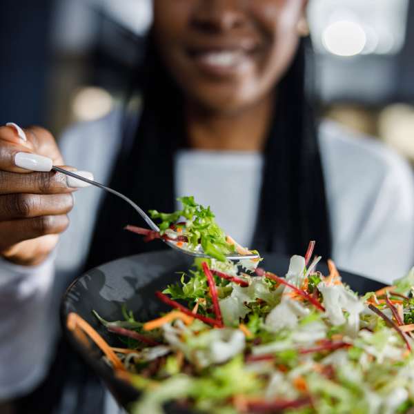 Residents eating salad at The Quarters at Lincoln in Lincoln, Nebraska