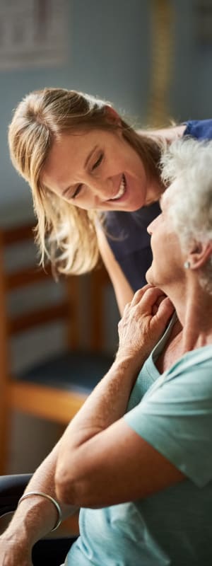 Staff assisting resident at Coral Plaza, Margate, FL