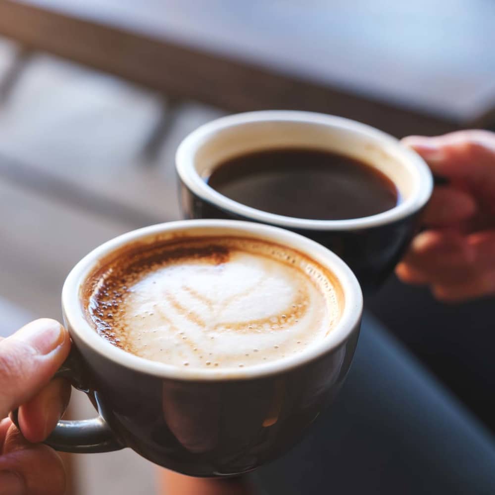 Residents having coffee in cafe near The Fernhill Apartments in Conover, North Carolina