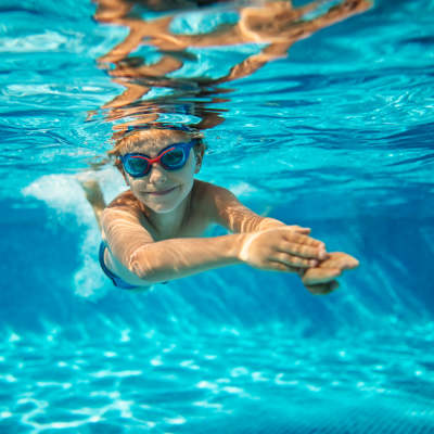 Kid enjoying in the pool at The Summit At Metrowest in Orlando, Florida