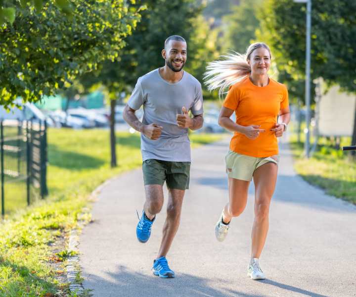 Resident jogging in the park near West Village Apartments in Hillsborough, North Carolina