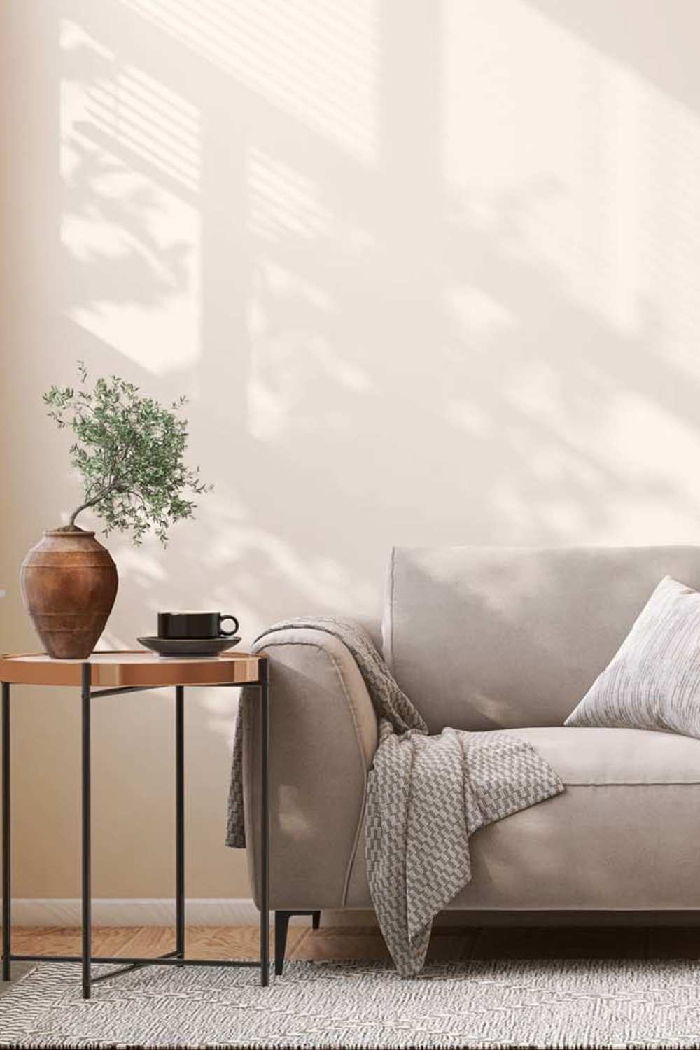 Couch and side table in a home at The Annex at Bridgeton in Portland, Oregon