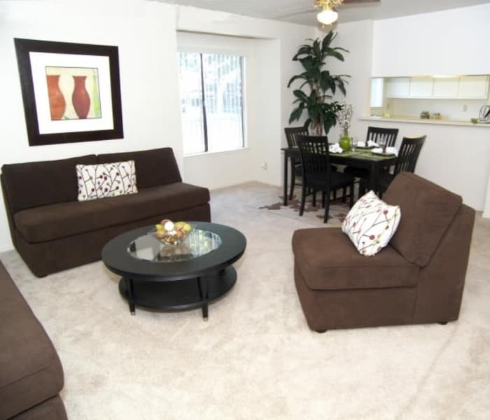 Bright and spacious living room at Waterfield Square Apartment Homes